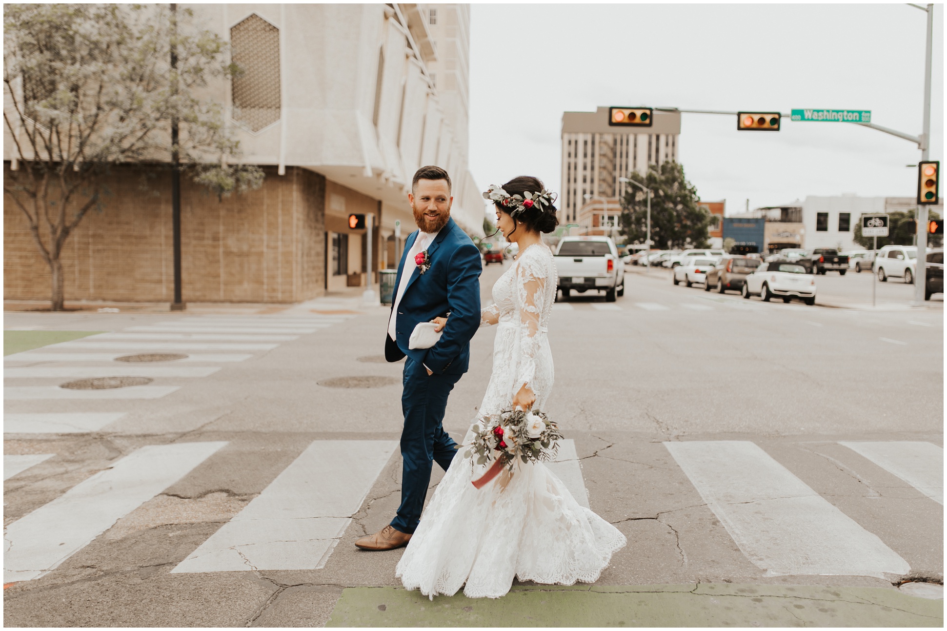 Eloped couple walking through downtown Waco